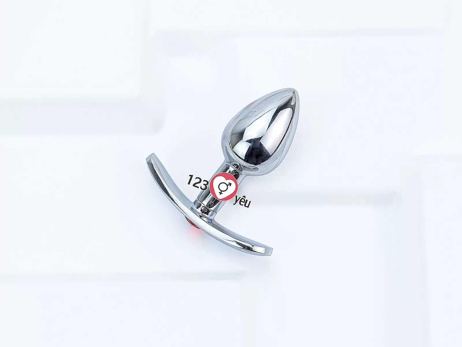 Dụng cụ kích thích hậu môn inox có tay cầm