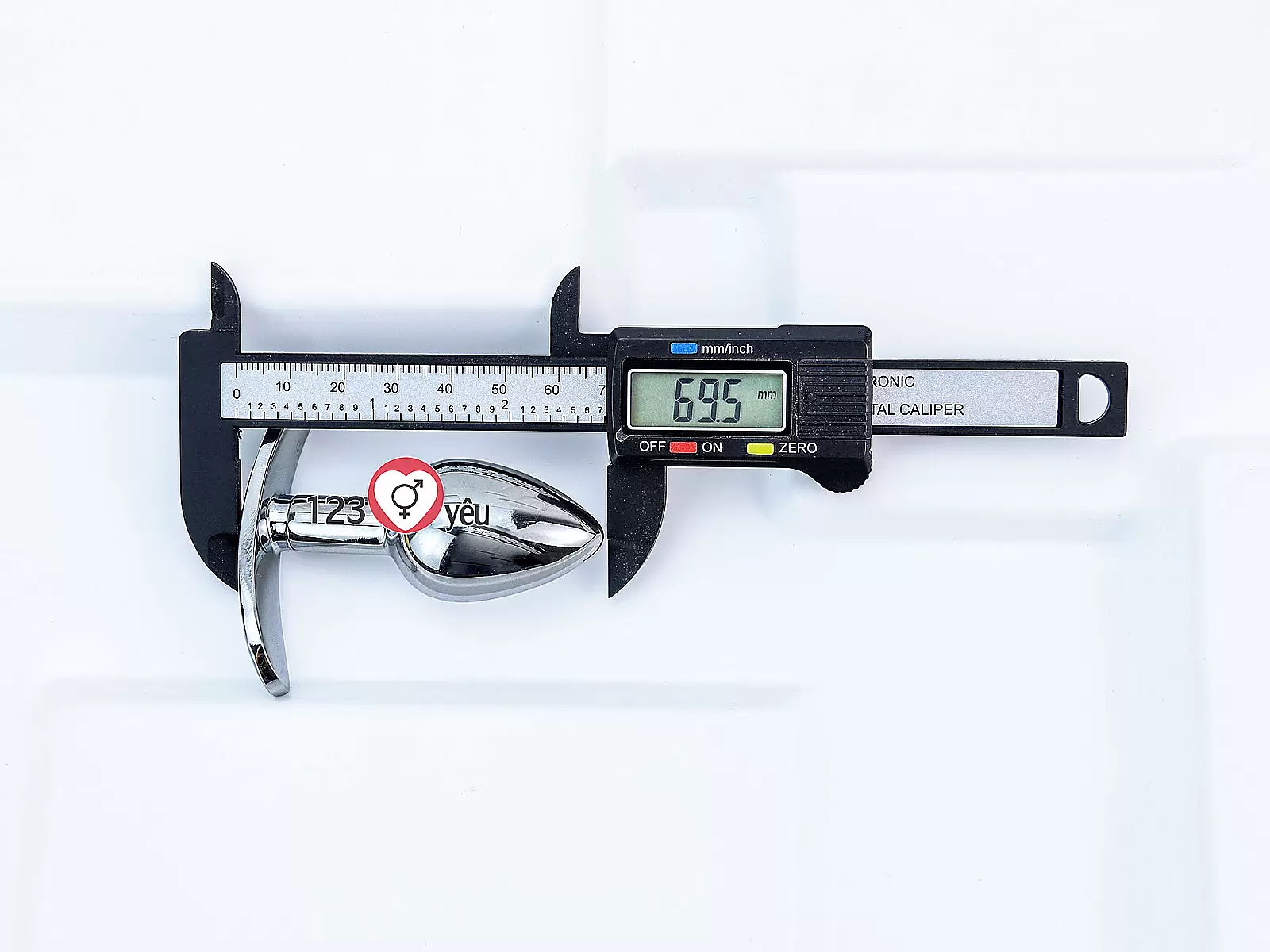 Dụng cụ kích thích hậu môn inox có tay cầm