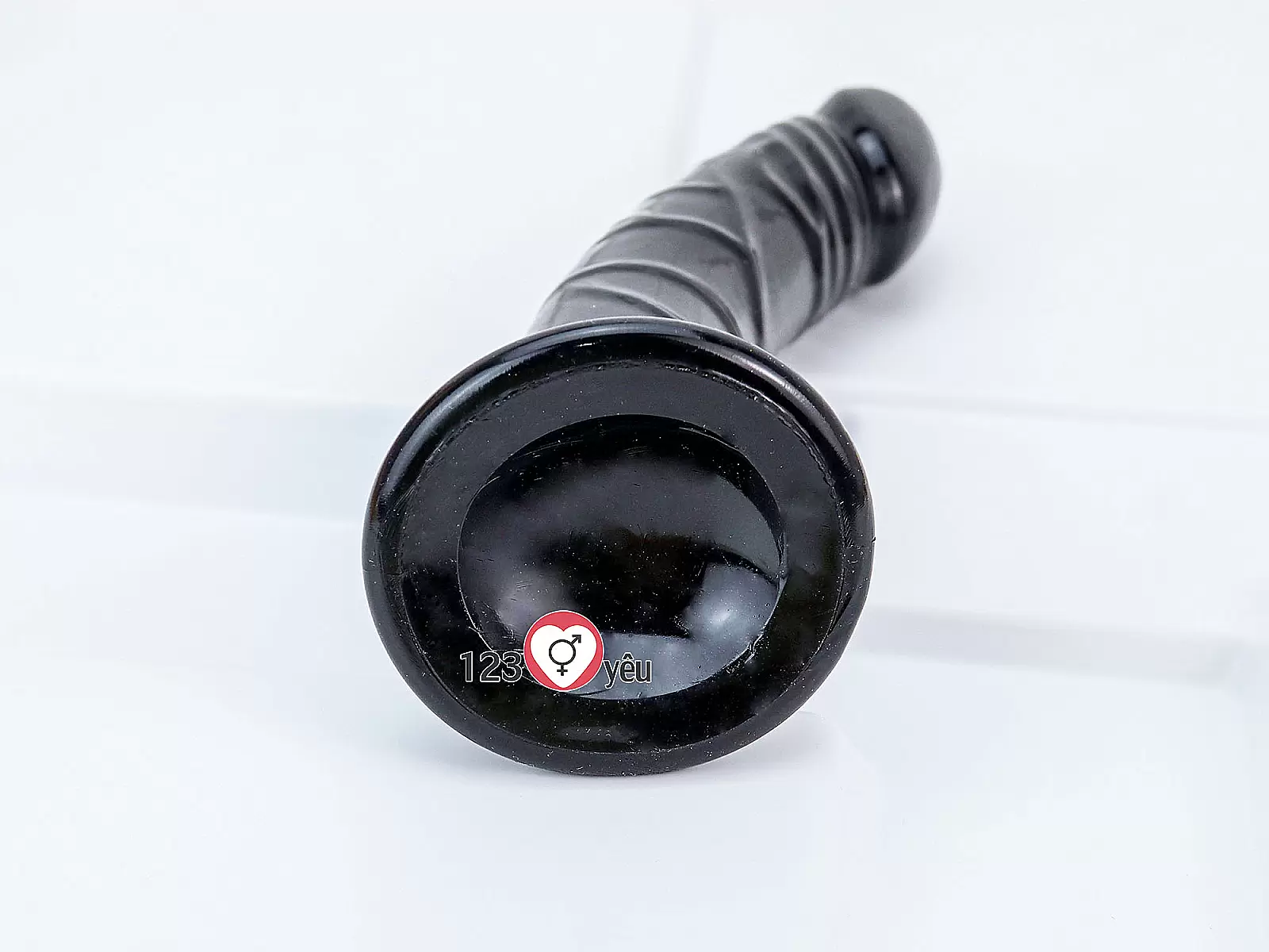 Dương vật giả có đế uốn cong silicon màu đen