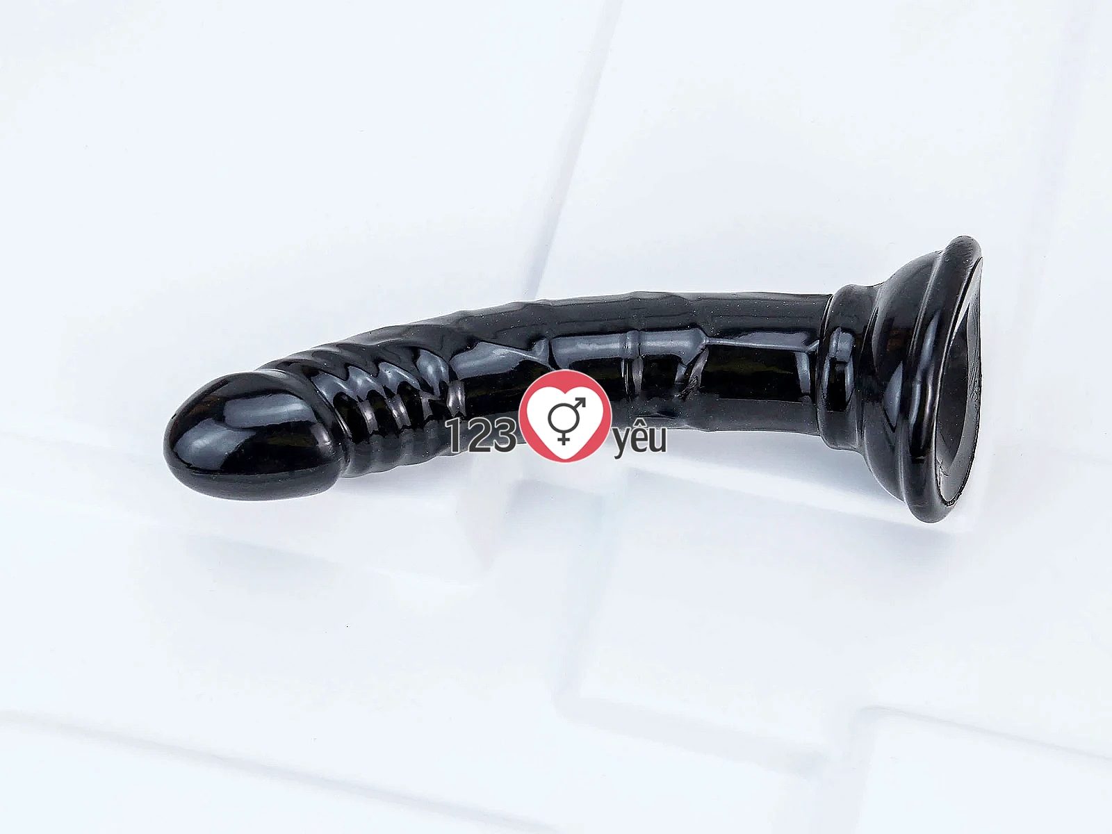 Dương vật giả có đế uốn cong silicon màu đen