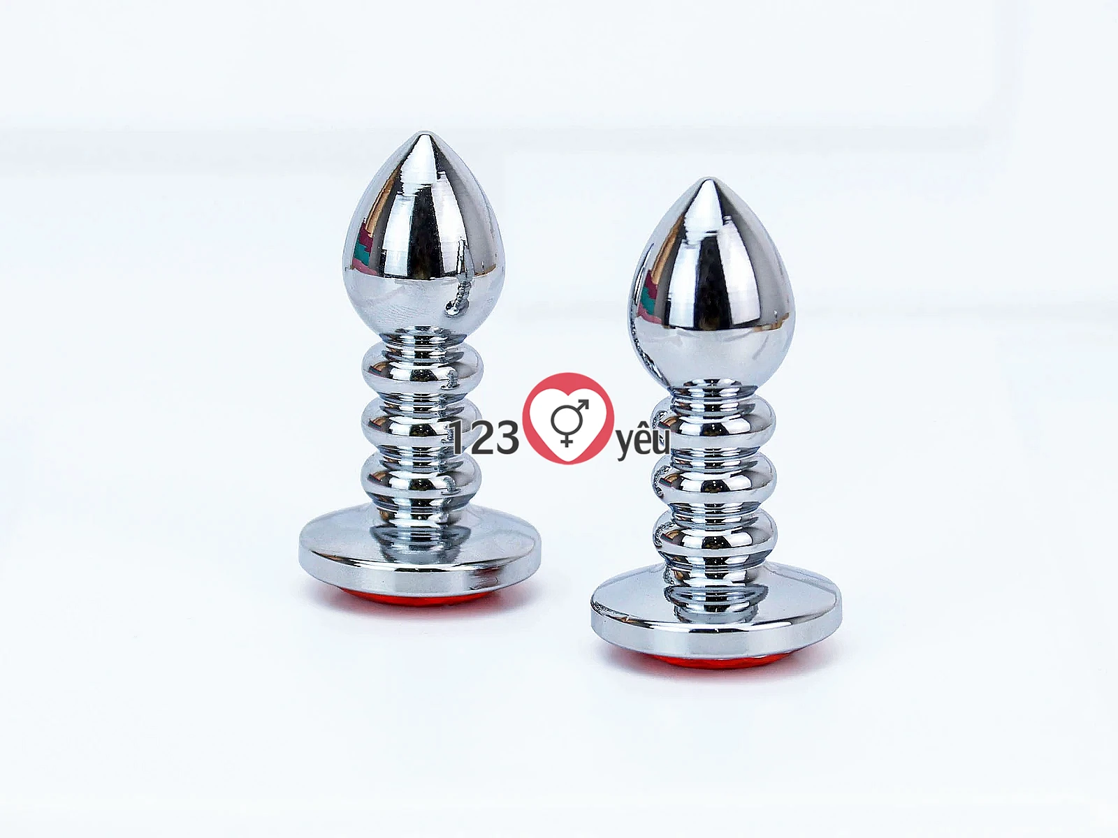 Đồ chơi kích hậu Inox xoắn ốc đuôi pha lê màu cam