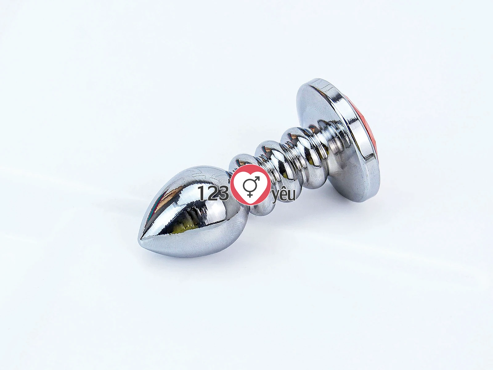 Đồ chơi kích hậu Inox xoắn ốc đuôi pha lê màu cam