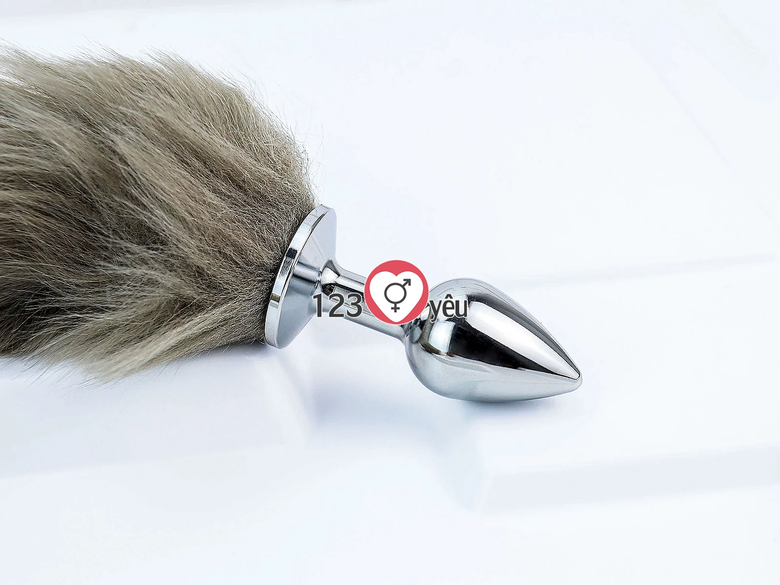Đồ chơi kích hậu inox đuôi sói xám rêu