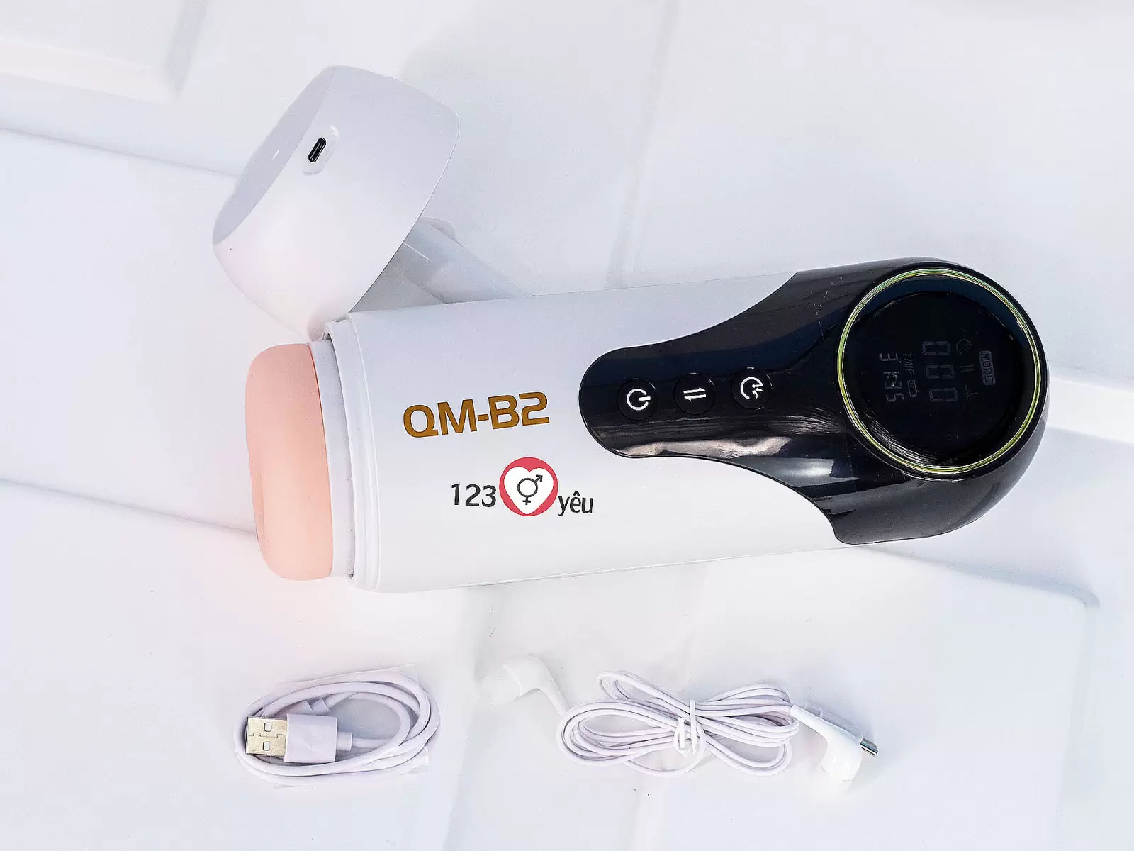 Máy thủ dâm QM-B2 rung, co bóp, sưởi ấm pin sạc